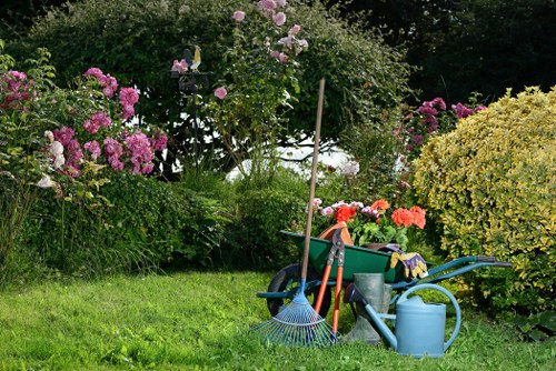 Gardening team arriving at a Wembley property with tools and safety gear